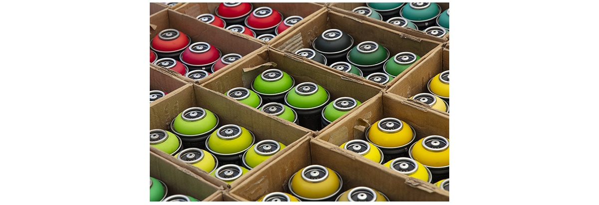 Packaging of Aerosol Cans in a Box